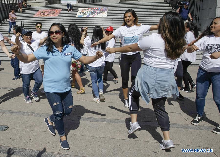 CANADA-VANCOUVER-MIGRANT WORKERS-FLASH MOB