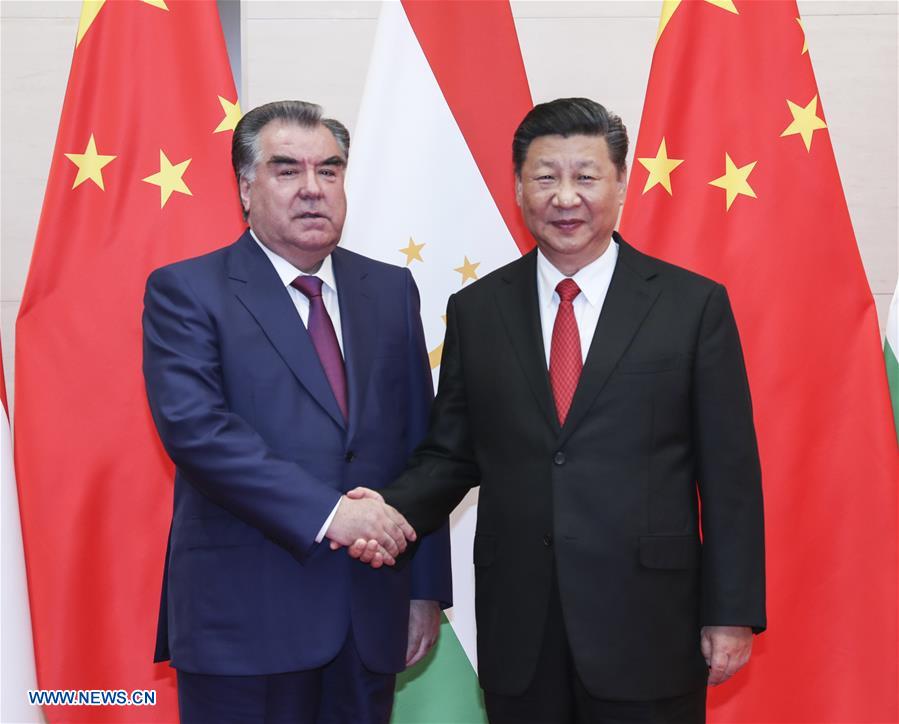 (SCO SUMMIT) CHINA-QINGDAO-XI JINPING-TAJIKISTAN-EMOMALI RAHMON-MEETING (CN)