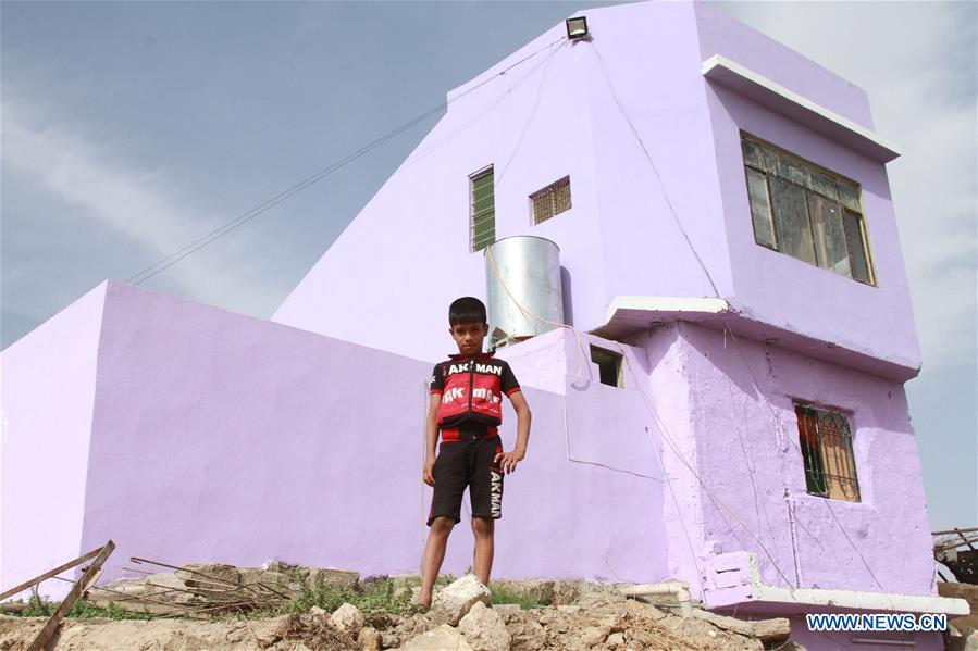 IRAQ-MOSUL-1ST HOUSE AMONG RUBBLE