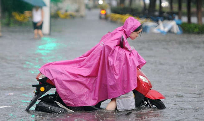 Heavy rain brought by typhoon Jongdari hits Jiujiang, E China's Jiangxi